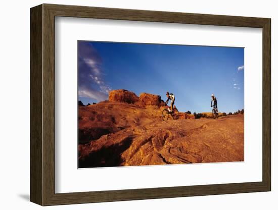 Two people mountain biking, Moab, Utah, USA-Richard Sisk-Framed Photographic Print