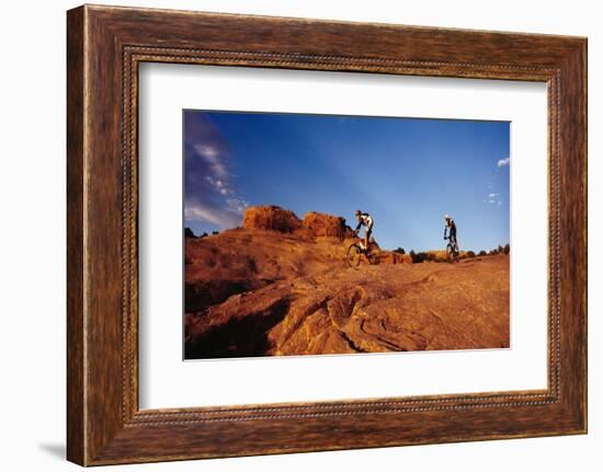 Two people mountain biking, Moab, Utah, USA-Richard Sisk-Framed Photographic Print