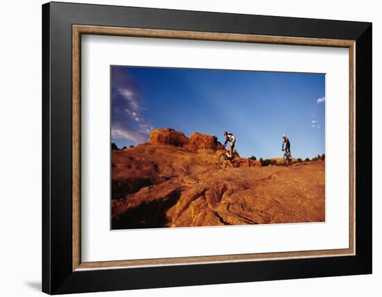 Two people mountain biking, Moab, Utah, USA-Richard Sisk-Framed Photographic Print