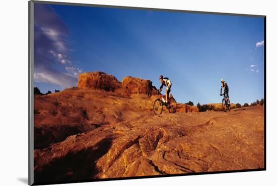 Two people mountain biking, Moab, Utah, USA-Richard Sisk-Mounted Photographic Print
