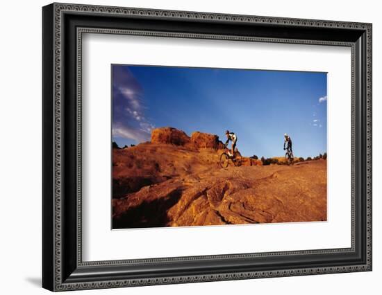 Two people mountain biking, Moab, Utah, USA-Richard Sisk-Framed Photographic Print