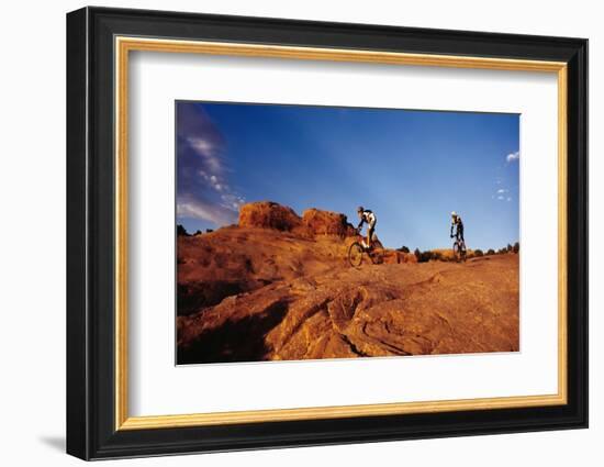 Two people mountain biking, Moab, Utah, USA-Richard Sisk-Framed Photographic Print