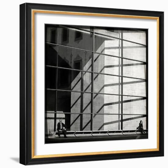 Two People Sitting Outside a Modern Glass Building-Eudald Castells-Framed Photographic Print