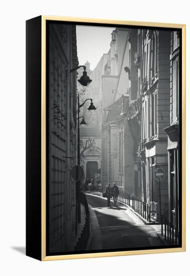 Two People Walking Up Sunny Side Street Near St Michel Notre Dame in Paris, France-Robert Such-Framed Premier Image Canvas
