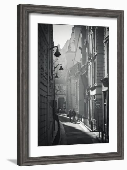 Two People Walking Up Sunny Side Street Near St Michel Notre Dame in Paris, France-Robert Such-Framed Photographic Print