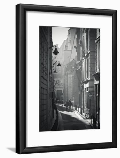 Two People Walking Up Sunny Side Street Near St Michel Notre Dame in Paris, France-Robert Such-Framed Photographic Print