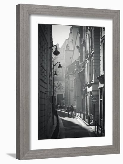 Two People Walking Up Sunny Side Street Near St Michel Notre Dame in Paris, France-Robert Such-Framed Photographic Print