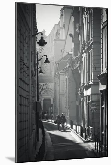 Two People Walking Up Sunny Side Street Near St Michel Notre Dame in Paris, France-Robert Such-Mounted Photographic Print