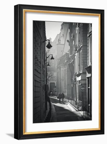 Two People Walking Up Sunny Side Street Near St Michel Notre Dame in Paris, France-Robert Such-Framed Photographic Print