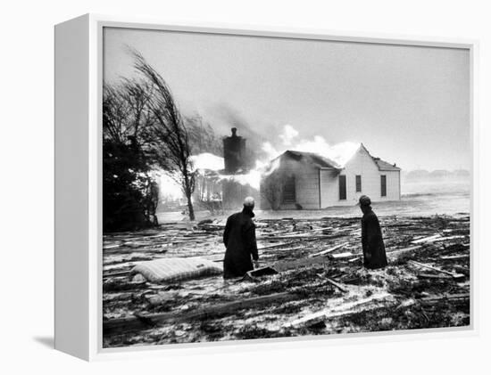 Two People Watching House Burn in Aftermath of Hurricane Hazel-Hank Walker-Framed Premier Image Canvas