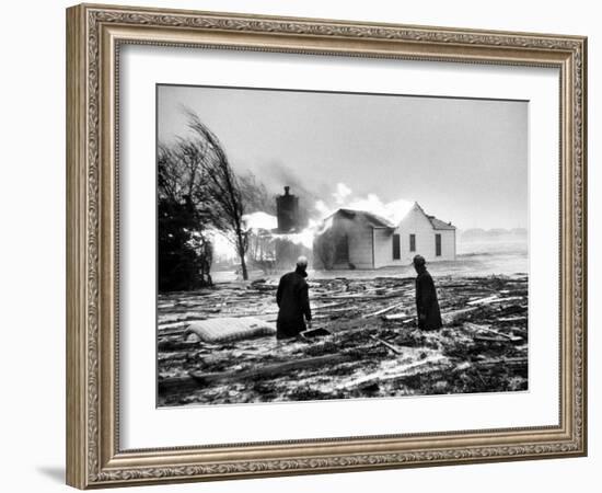 Two People Watching House Burn in Aftermath of Hurricane Hazel-Hank Walker-Framed Photographic Print