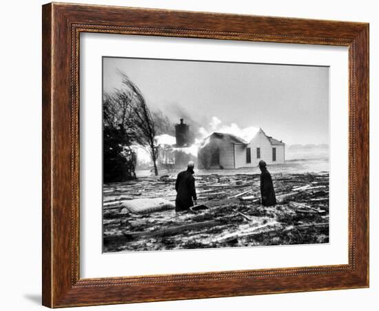 Two People Watching House Burn in Aftermath of Hurricane Hazel-Hank Walker-Framed Photographic Print