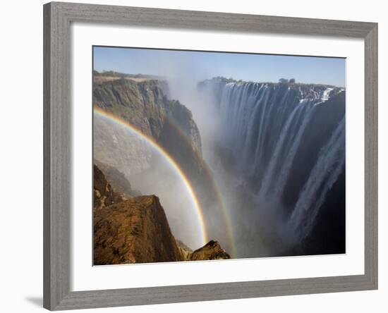 Two Rainbows Rest in Between Zimbabwe and Zambia Seen from the Zambian Side of Victoria Falls.-Karine Aigner-Framed Photographic Print