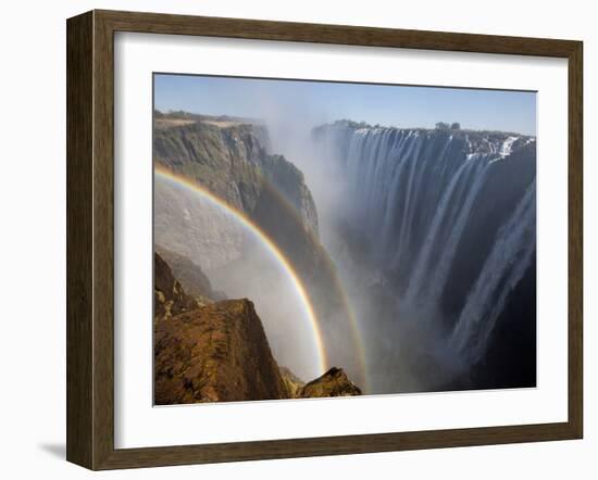 Two Rainbows Rest in Between Zimbabwe and Zambia Seen from the Zambian Side of Victoria Falls.-Karine Aigner-Framed Photographic Print