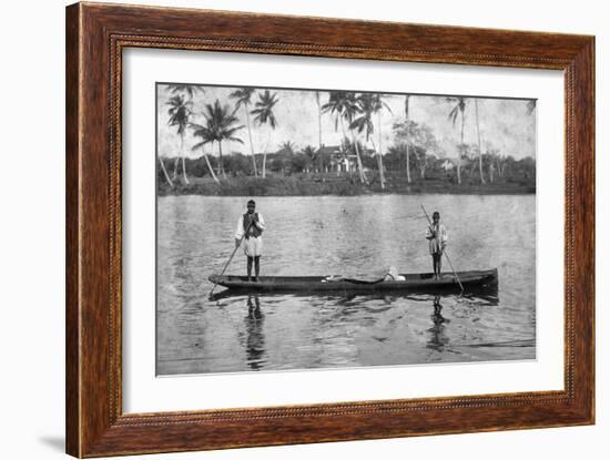 Two Seminole Indians Pole a Canoe on the Miami River, C.1895-null-Framed Photographic Print