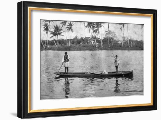 Two Seminole Indians Pole a Canoe on the Miami River, C.1895-null-Framed Photographic Print