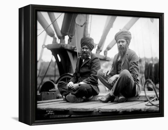 Two Sikh Men Sitting on a Dock, Circa 1913-Asahel Curtis-Framed Premier Image Canvas