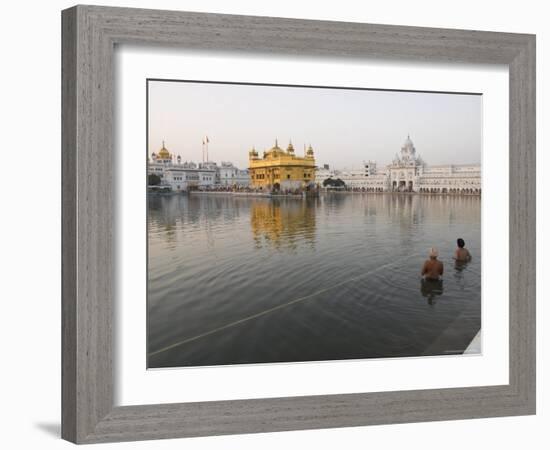 Two Sikh Pilgrims Bathing and Praying in the Early Morning in Holy Pool, Amritsar, India-Eitan Simanor-Framed Photographic Print