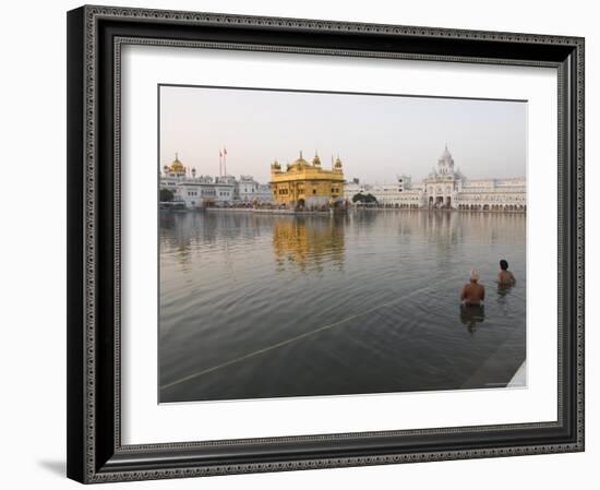 Two Sikh Pilgrims Bathing and Praying in the Early Morning in Holy Pool, Amritsar, India-Eitan Simanor-Framed Photographic Print