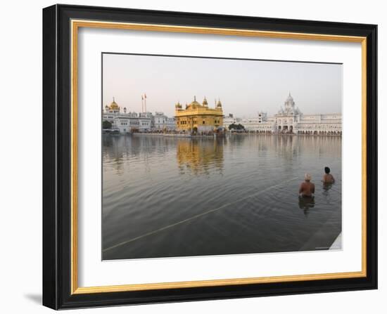 Two Sikh Pilgrims Bathing and Praying in the Early Morning in Holy Pool, Amritsar, India-Eitan Simanor-Framed Photographic Print