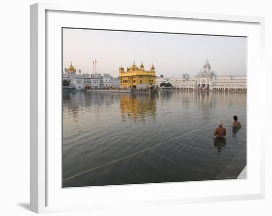 Two Sikh Pilgrims Bathing and Praying in the Early Morning in Holy Pool, Amritsar, India-Eitan Simanor-Framed Photographic Print