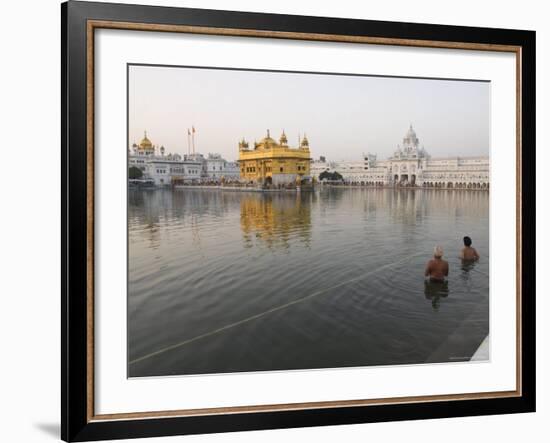 Two Sikh Pilgrims Bathing and Praying in the Early Morning in Holy Pool, Amritsar, India-Eitan Simanor-Framed Photographic Print