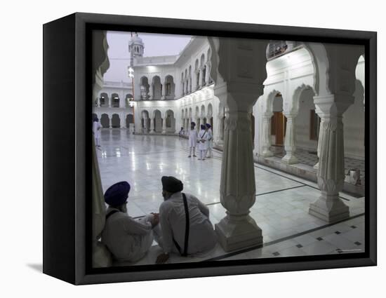 Two Sikhs Priests at Dawn Sitting Under Arcades, Golden Temple, Amritsar, Punjab State, India-Eitan Simanor-Framed Premier Image Canvas