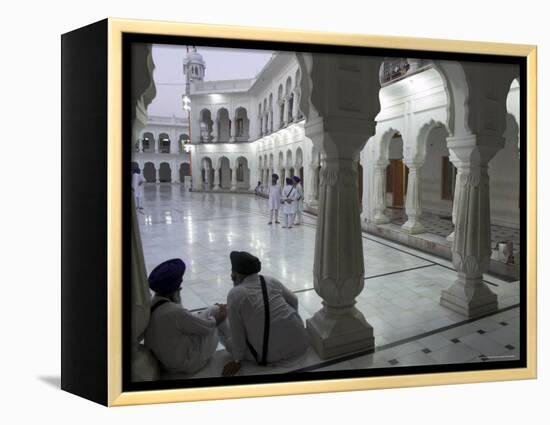 Two Sikhs Priests at Dawn Sitting Under Arcades, Golden Temple, Amritsar, Punjab State, India-Eitan Simanor-Framed Premier Image Canvas