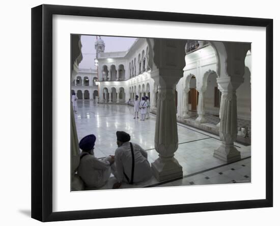 Two Sikhs Priests at Dawn Sitting Under Arcades, Golden Temple, Amritsar, Punjab State, India-Eitan Simanor-Framed Photographic Print