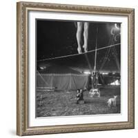Two Small Children Watching Circus Performer Practicing on Tightrope, Her Legs Only Visible-Nina Leen-Framed Photographic Print