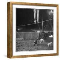 Two Small Children Watching Circus Performer Practicing on Tightrope, Her Legs Only Visible-Nina Leen-Framed Photographic Print