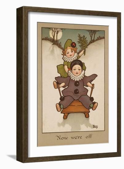 Two Small Children, Wearing Clown and Pierrot Costumes Have Fun in the Snow on a Sledge-null-Framed Art Print