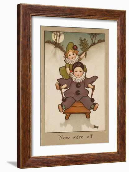 Two Small Children, Wearing Clown and Pierrot Costumes Have Fun in the Snow on a Sledge-null-Framed Art Print