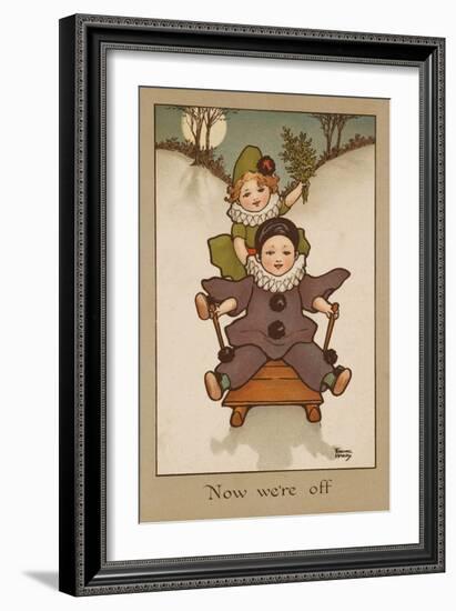 Two Small Children, Wearing Clown and Pierrot Costumes Have Fun in the Snow on a Sledge-null-Framed Art Print