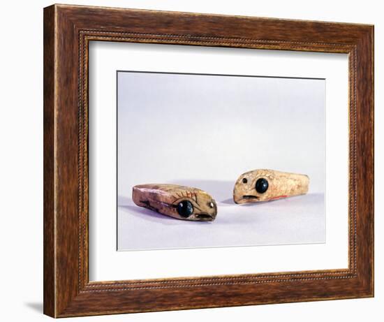 Two small ivory carvings of bird heads-Werner Forman-Framed Giclee Print