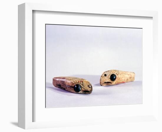 Two small ivory carvings of bird heads-Werner Forman-Framed Giclee Print