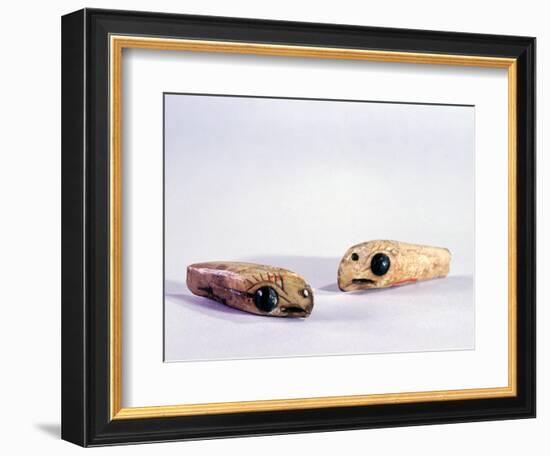 Two small ivory carvings of bird heads-Werner Forman-Framed Giclee Print