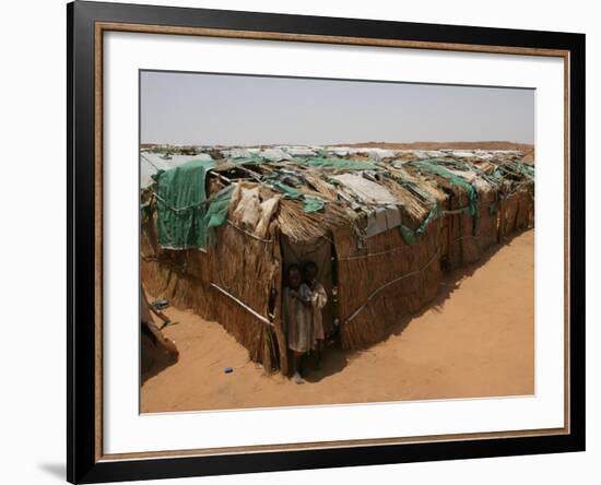 Two Sudanese Boys Stand by Makeshift Huts-null-Framed Photographic Print