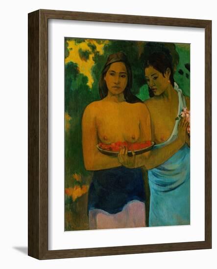 Two Tahitian women offering red fruits and pink flowers. Oil on canvas (1899) 94 x 72.2 cm-Paul Gauguin-Framed Giclee Print