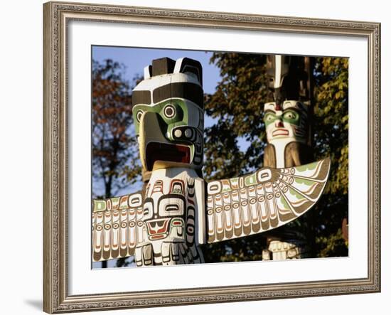 Two Totem Poles, Stanley Park, Vancouver, British Columbia, Canada-Walter Bibikow-Framed Photographic Print