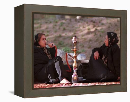 Two Unidentified Iranian Women Smoke a Water Pipe-null-Framed Premier Image Canvas