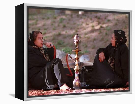 Two Unidentified Iranian Women Smoke a Water Pipe-null-Framed Premier Image Canvas