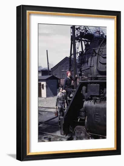 Two Women Ascend the Engine-null-Framed Art Print