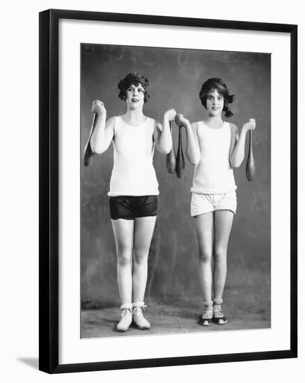 Two Women Exercising with Juggling Pins-null-Framed Photo