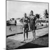 Two Women in Swimsuits Beside a Swimming Pool, Balboa, Panama, 1931-null-Mounted Photographic Print
