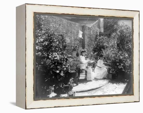 Two Women in their Garden in Cuba Photograph - Cuba-Lantern Press-Framed Stretched Canvas