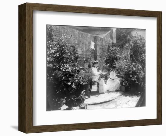 Two Women in their Garden in Cuba Photograph - Cuba-Lantern Press-Framed Art Print