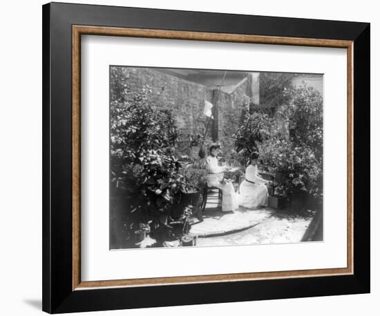 Two Women in their Garden in Cuba Photograph - Cuba-Lantern Press-Framed Art Print