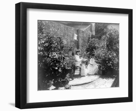 Two Women in their Garden in Cuba Photograph - Cuba-Lantern Press-Framed Art Print