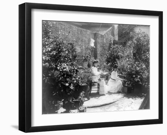 Two Women in their Garden in Cuba Photograph - Cuba-Lantern Press-Framed Art Print